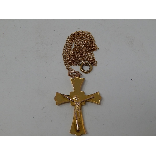 93 - 9ct Gold Crucifix on 9ct gold chain. Length of chain 40cm. weight 2.46g