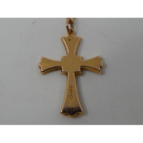 93 - 9ct Gold Crucifix on 9ct gold chain. Length of chain 40cm. weight 2.46g