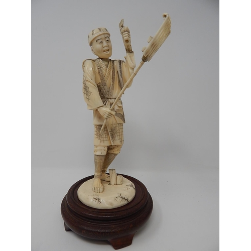 842 - Meiji (1868-1912) Japanese Ivory Figure, Signed to Base on Wooden Stand. The Figure 20.5cm High