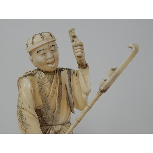 842 - Meiji (1868-1912) Japanese Ivory Figure, Signed to Base on Wooden Stand. The Figure 20.5cm High