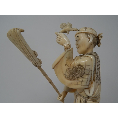 842 - Meiji (1868-1912) Japanese Ivory Figure, Signed to Base on Wooden Stand. The Figure 20.5cm High