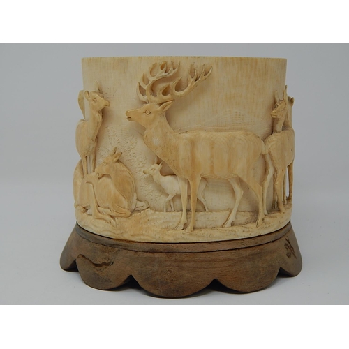 844 - Antique African Ivory Tusk Carved with an all round Relief of Gazelle & Their Young. 11cm wide x 11c... 