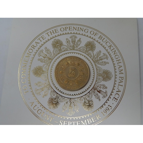 301 - Crown size medallion commemorating the opening of Buckingham Palace together with a Coronation 1/2 C... 