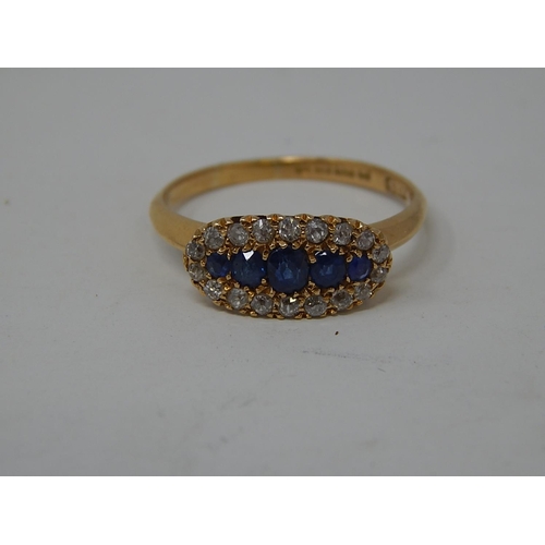 101 - Art Deco 18ct Gold Hallmarked Diamond & Sapphire Ring, set with Five central sapphires with a border... 