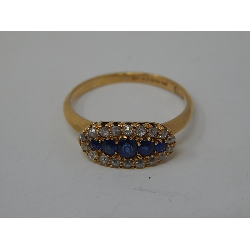 101 - Art Deco 18ct Gold Hallmarked Diamond & Sapphire Ring, set with Five central sapphires with a border... 