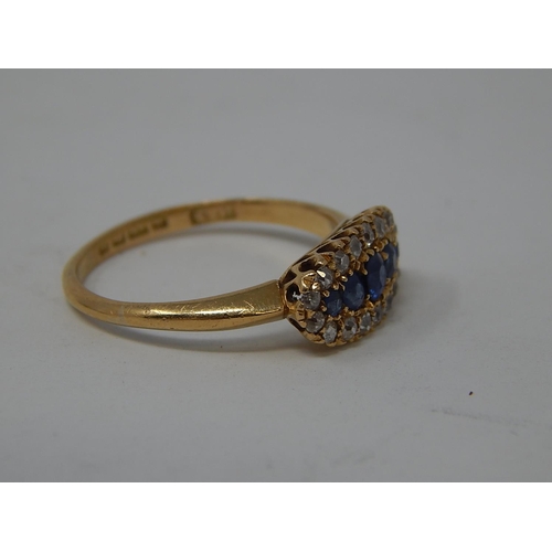 101 - Art Deco 18ct Gold Hallmarked Diamond & Sapphire Ring, set with Five central sapphires with a border... 