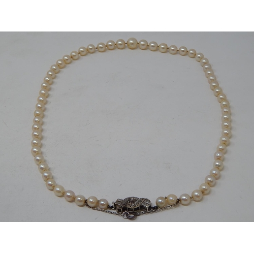 104 - Art Deco Pearl Necklace with 9ct White Gold Clasp set with 4 Baguette Cut Diamonds & 16 old cut Diam... 