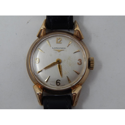 224 - Longines: Ladies 9ct Gold wristwatch on leather strap. currently working.