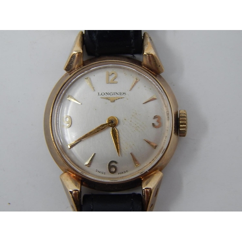 224 - Longines: Ladies 9ct Gold wristwatch on leather strap. currently working.