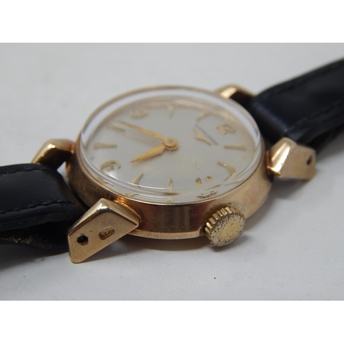 224 - Longines: Ladies 9ct Gold wristwatch on leather strap. currently working.