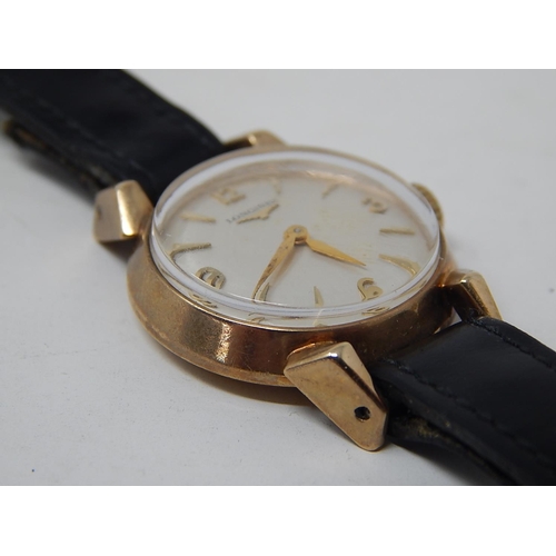 224 - Longines: Ladies 9ct Gold wristwatch on leather strap. currently working.