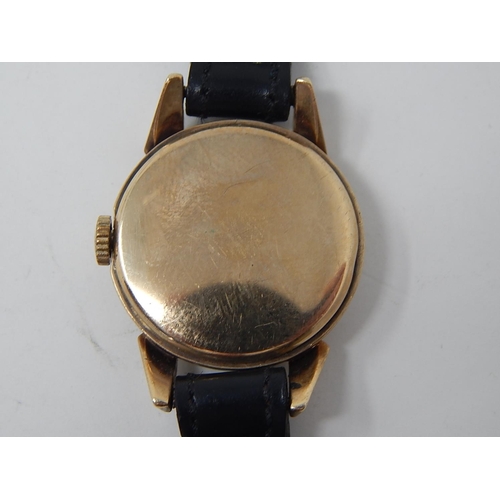 224 - Longines: Ladies 9ct Gold wristwatch on leather strap. currently working.