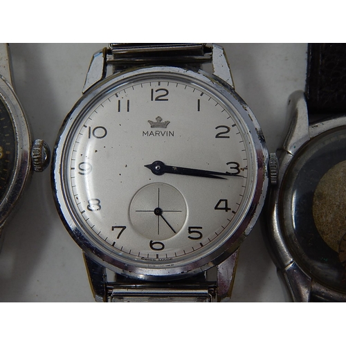 229 - Group of 5 Gentleman's wristwatches to include: Marvin, Nisus, Nivrel etc