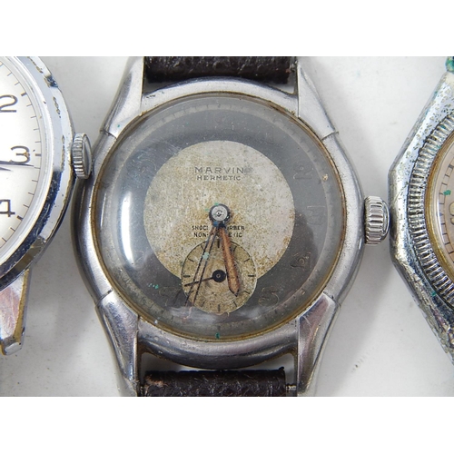 229 - Group of 5 Gentleman's wristwatches to include: Marvin, Nisus, Nivrel etc