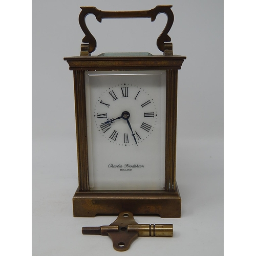 234 - Charles Frodsham Brass Carriage Clock with visible escapement, white dial with Roman numerals, compl... 