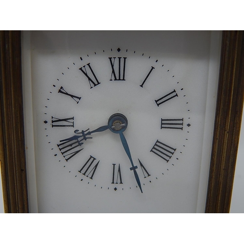 234 - Charles Frodsham Brass Carriage Clock with visible escapement, white dial with Roman numerals, compl... 