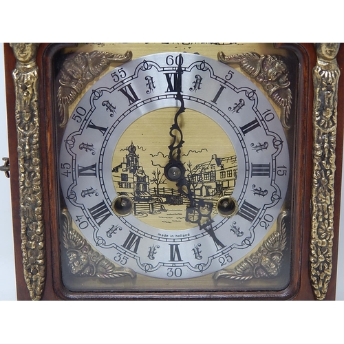 242 - Dutch Moon Phase Bracket Clock Striking on the hour & half hour on a bell. The Brass face with angel... 