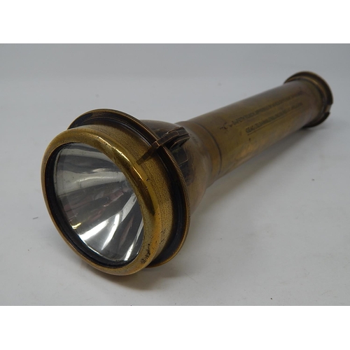 332 - WWII: Brass Torch inscribed 