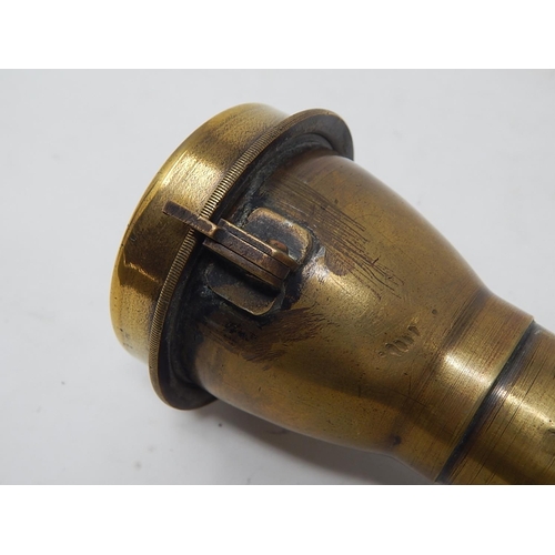 332 - WWII: Brass Torch inscribed 