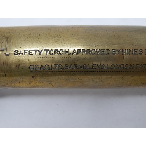 332 - WWII: Brass Torch inscribed 