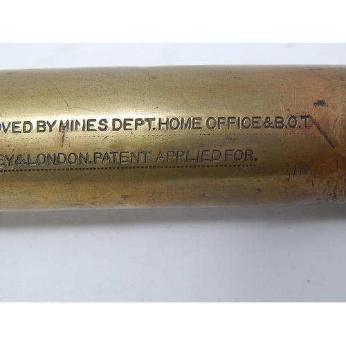 332 - WWII: Brass Torch inscribed 