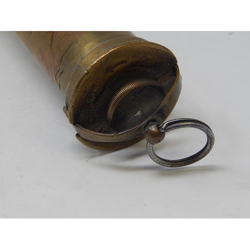 332 - WWII: Brass Torch inscribed 