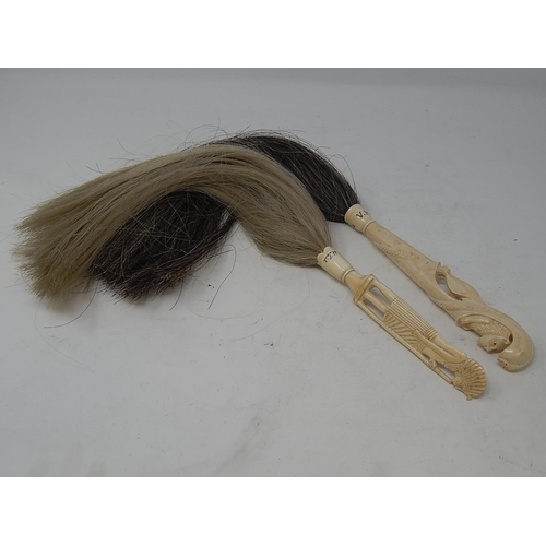 805 - Two 1930's Ivory Handled Fly Whisks. The Handles Modelled as an Egyptian & an Upright Lion With Serp... 