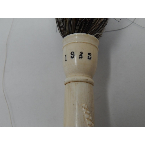 805 - Two 1930's Ivory Handled Fly Whisks. The Handles Modelled as an Egyptian & an Upright Lion With Serp... 