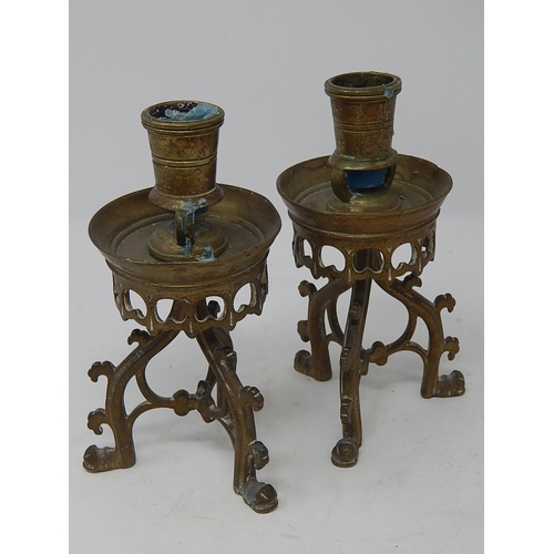 809 - Pair of Victorian Gothic Brass Candlesticks. Each Measure 17cm high.