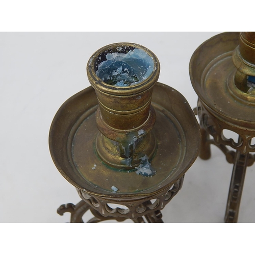 809 - Pair of Victorian Gothic Brass Candlesticks. Each Measure 17cm high.