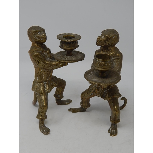 812 - Pair of Regency Brass Candlesticks fashioned as monkeys holding trays. The monkeys still with good d... 