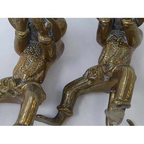 812 - Pair of Regency Brass Candlesticks fashioned as monkeys holding trays. The monkeys still with good d... 