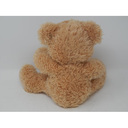 815 - Steiff Teddy Bear with Button & Label to ear. Height 29cm