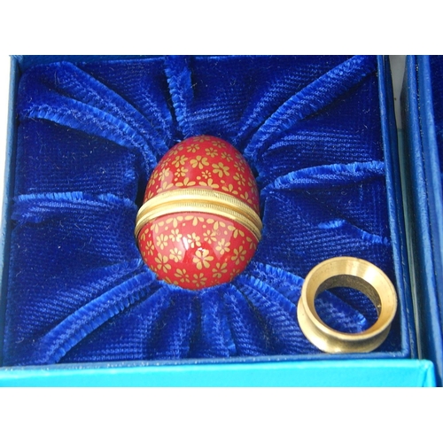 820 - BILSTON: Seven Enamel Eggs/Boxes together with Two CRUMMLES Enamel Boxes, All within their original ... 