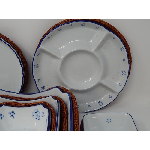 485 - Chinese Dishes of varying sizes within their fitted baskets.