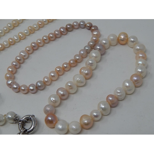 12 - Two Pearl Necklaces, Three Pearl Bracelets & a Charm Bracelet.