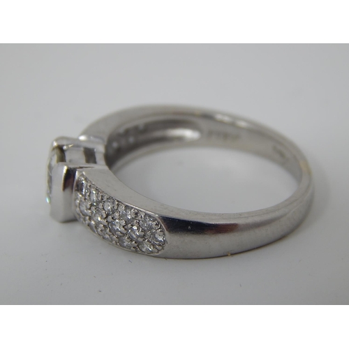 24 - Platinum 950, 1.4ct Diamond Ring Inset with a Central Diamond Approx. 0.80ct & Diamond Shoulders Set... 