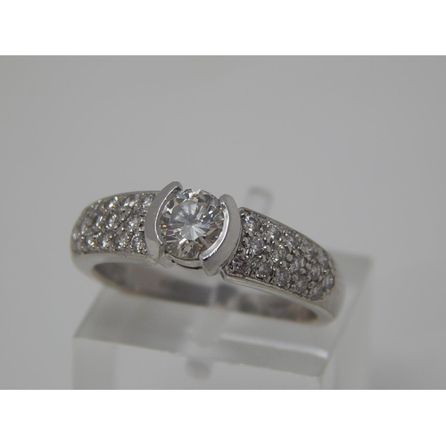 24 - Platinum 950, 1.4ct Diamond Ring Inset with a Central Diamond Approx. 0.80ct & Diamond Shoulders Set... 