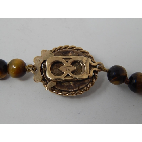 34 - Tigers Eye Necklace with 9ct Gold Hallmarked Clasp. Length 40cm.