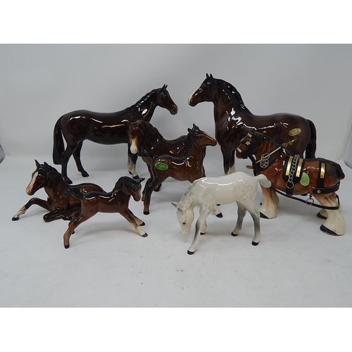 343 - Beswick: Seven Horses including the Huntsman within their original boxes/packaging together with a M... 