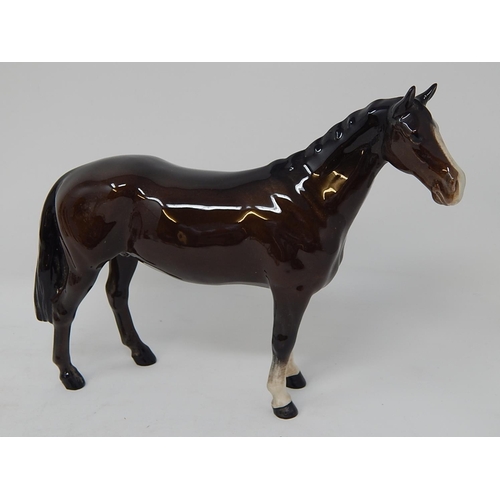 343 - Beswick: Seven Horses including the Huntsman within their original boxes/packaging together with a M... 