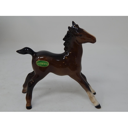 343 - Beswick: Seven Horses including the Huntsman within their original boxes/packaging together with a M... 