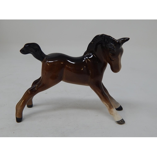 343 - Beswick: Seven Horses including the Huntsman within their original boxes/packaging together with a M... 