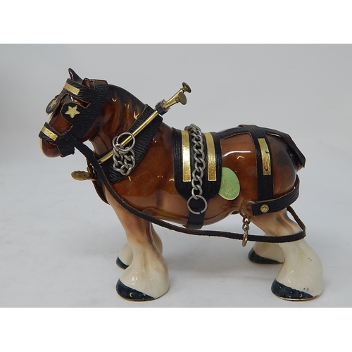 343 - Beswick: Seven Horses including the Huntsman within their original boxes/packaging together with a M... 