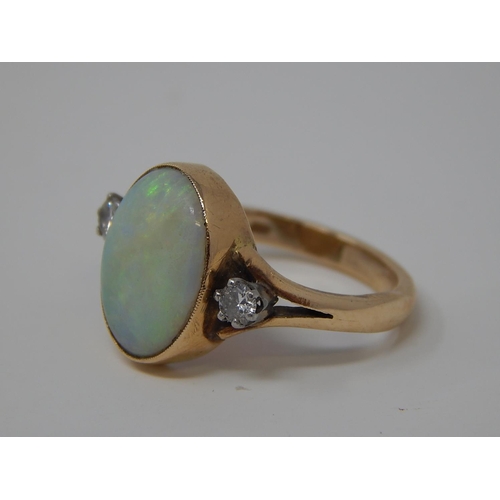 48 - Gold Ring Set with Central Opal approx 5ct & Flanked by Two Diamonds 0.25ct Size N