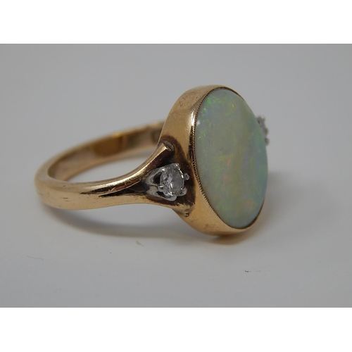 48 - Gold Ring Set with Central Opal approx 5ct & Flanked by Two Diamonds 0.25ct Size N