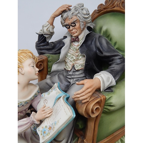 358 - Large Capodimonte Figural Group of a Child Reading to Her Father on Wooden Stand. Measures 42cm wide... 