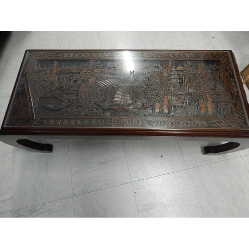 826 - Chinese Hardwood Table, The top & sides carved in deep relief with figural scenes. Measuring 106cm w... 