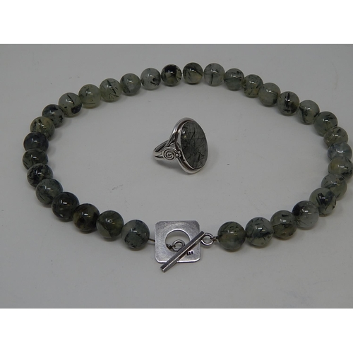 77 - Designer Ruticulated Green Prehrite Bead Necklace with Silver Fittings together with a similar ring