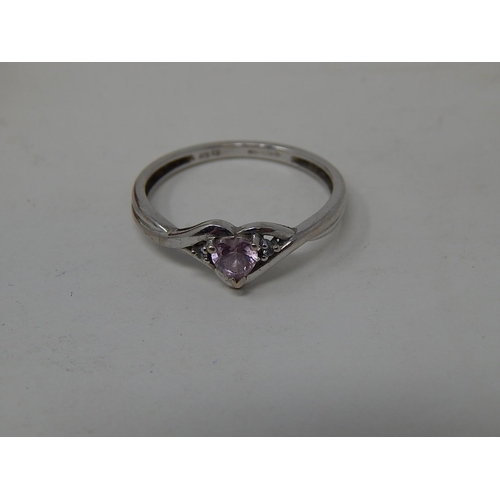 84 - 9ct White Gold Ring together with a white metal gem set ring.